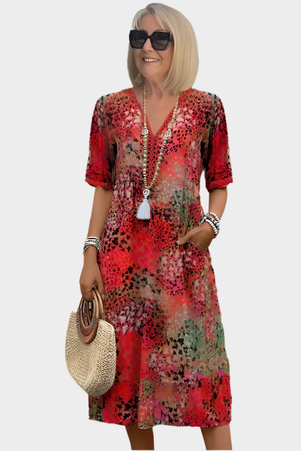 Abito midi vivace con tasche