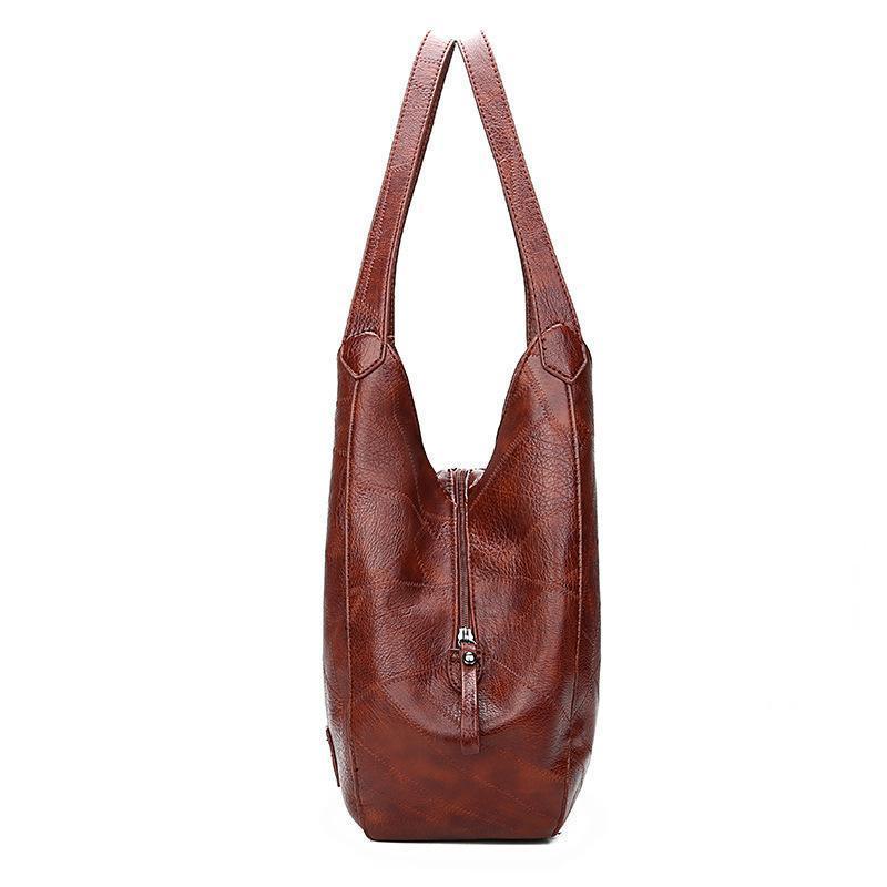 Ciondolo Penelope™ | Borsa tote vintage