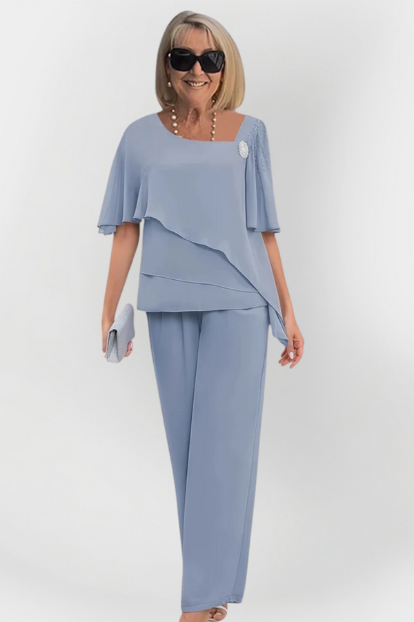 Elegante set doppio di camicetta e pantaloni