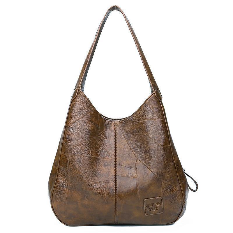 Ciondolo Penelope™ | Borsa tote vintage