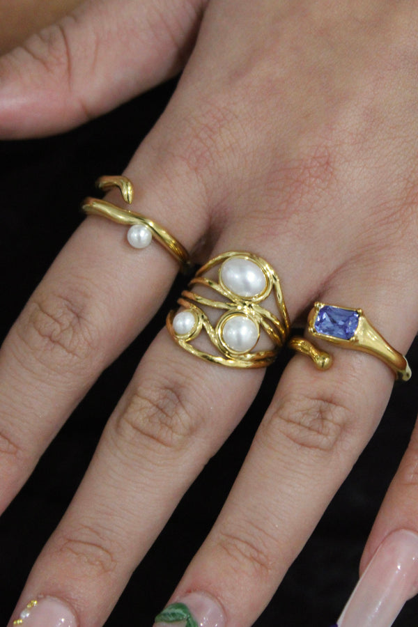 Anello geometrico con perla