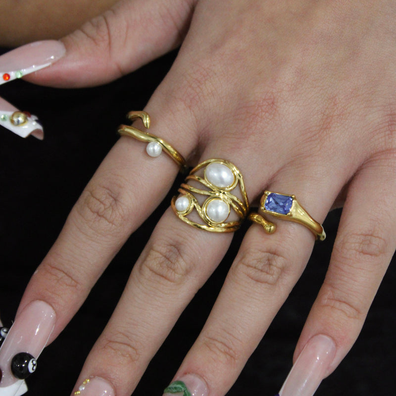 Anello geometrico con perla