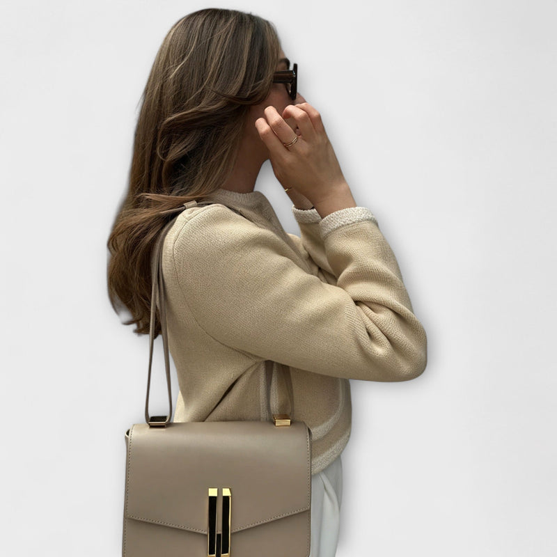 Cardigan classico con tasche decorative