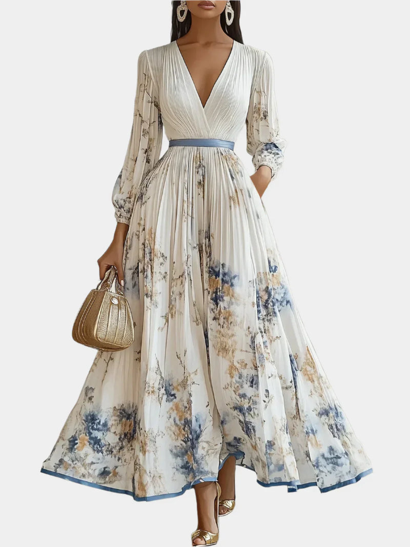 Abito lungo con maniche a sbuffo e scollo a V