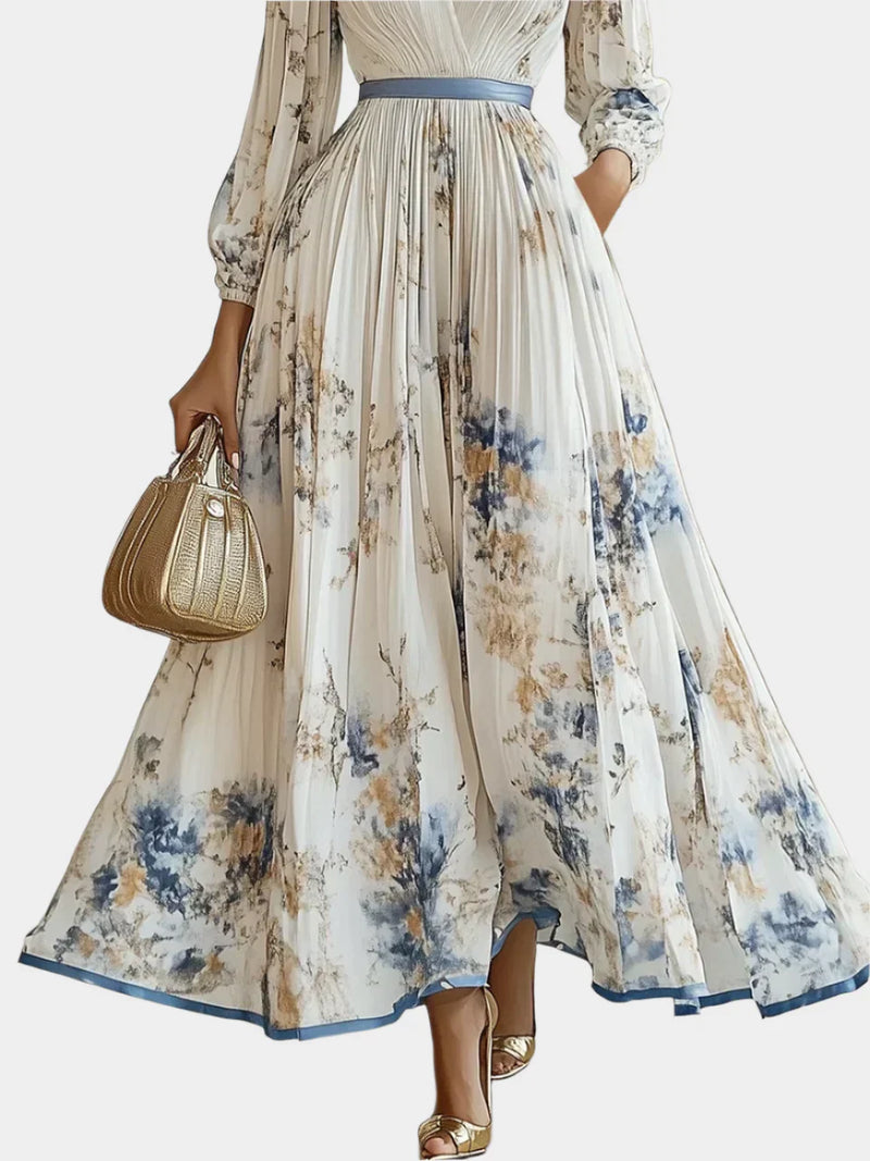 Abito lungo con maniche a sbuffo e scollo a V