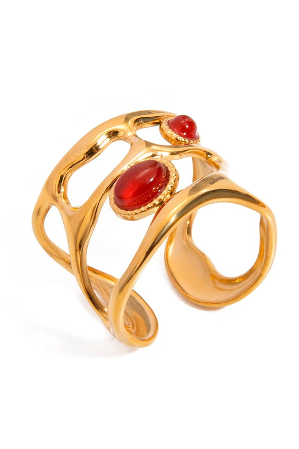 Anello geometrico con pietra rossa
