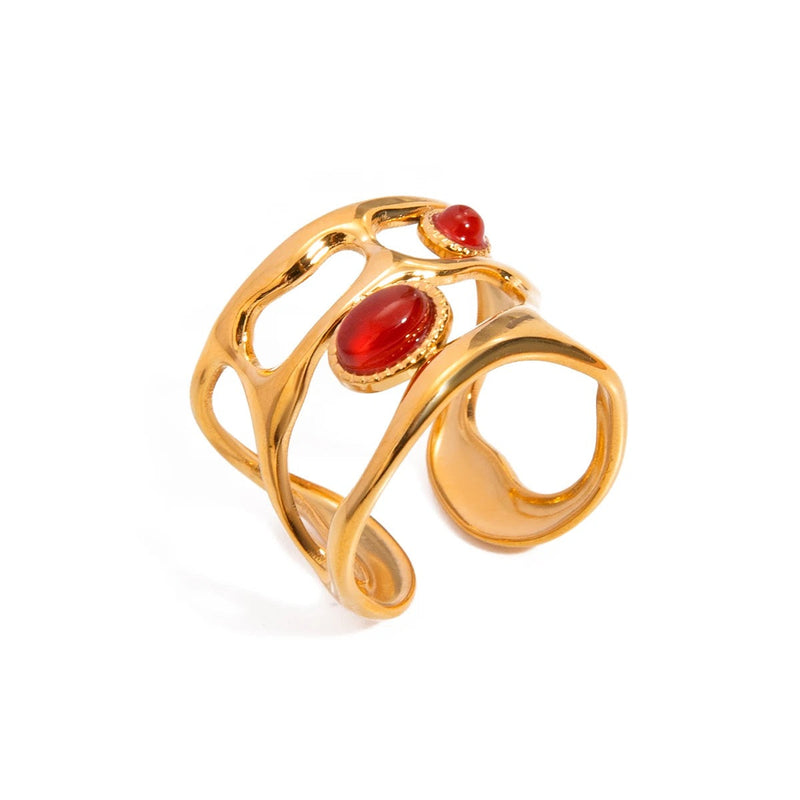 Anello geometrico con pietra rossa