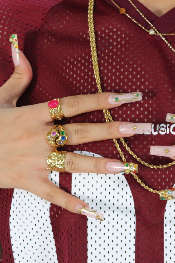 Anello con gemma effetto spruzzo di colore