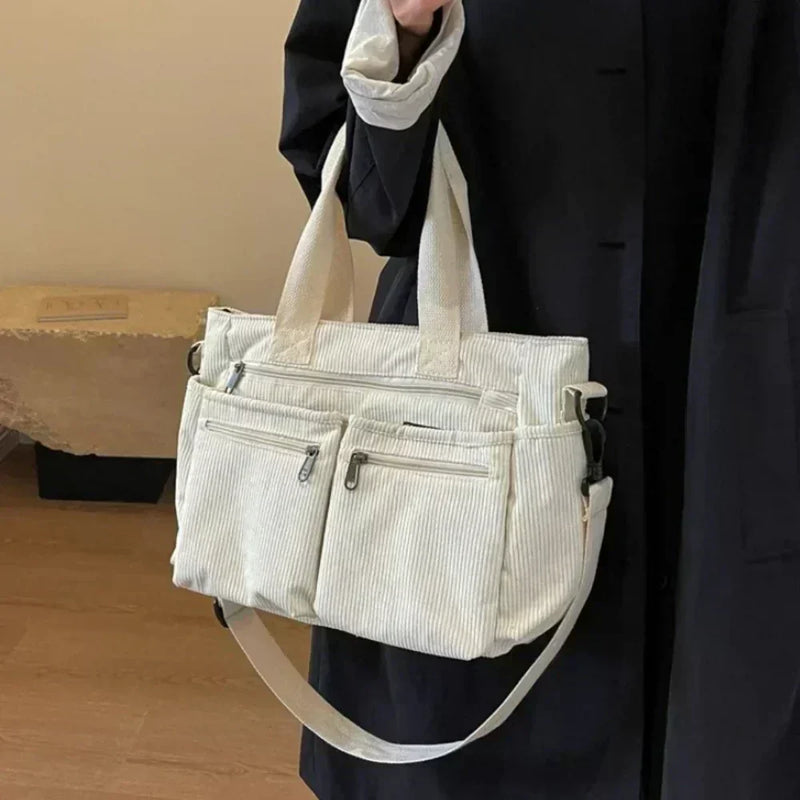 Lina™ - Borsa con coulisse e dettagli fatti a mano