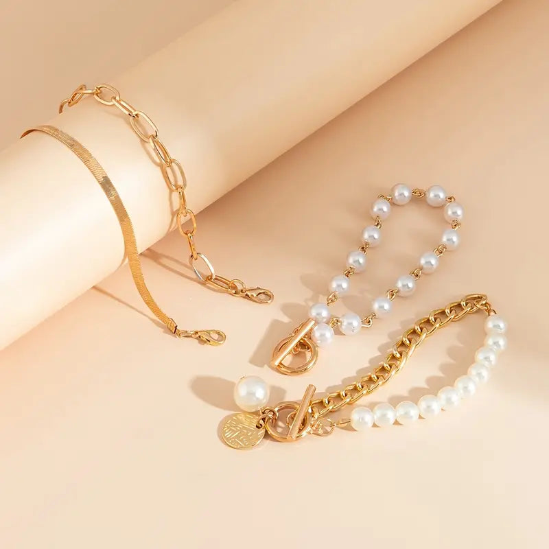 Set di 4 Braccialetti Chic Oro – Serpente, Perle e Anelli | Oro