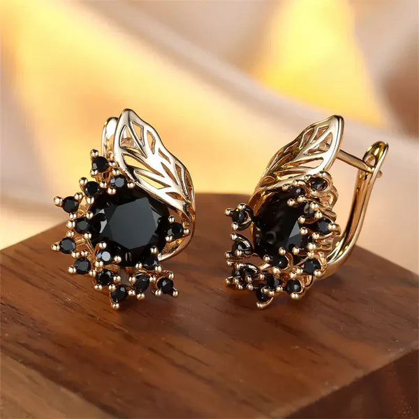 Orecchini dorati in zirconia nera | Oro